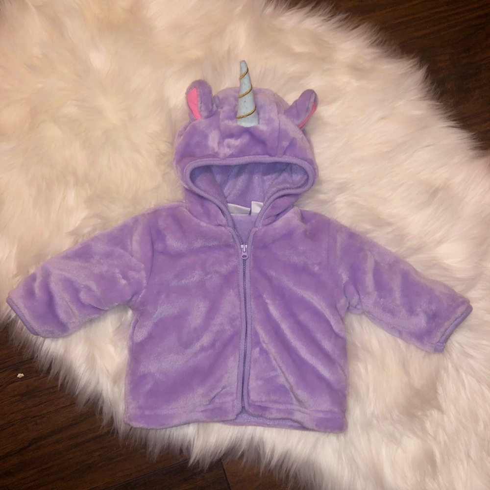 Two baby girl sweaters